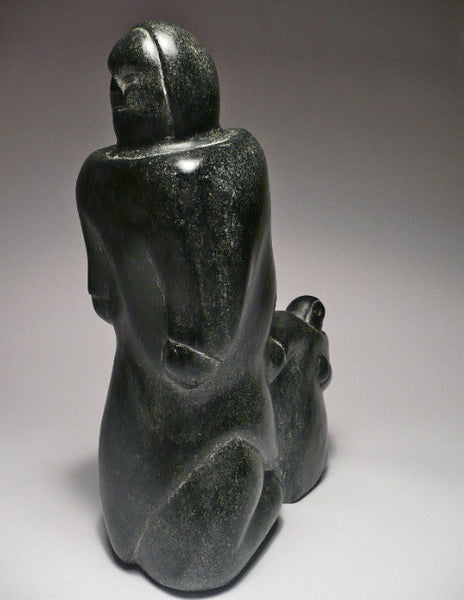 Man with a Baby by Louie Arnayuirnaaq, 1990s